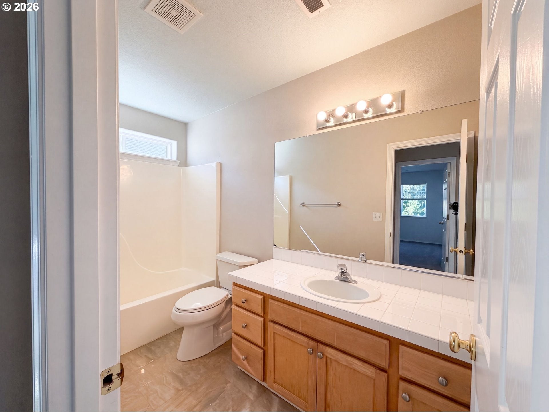 1267 NE MORNING SUN DR