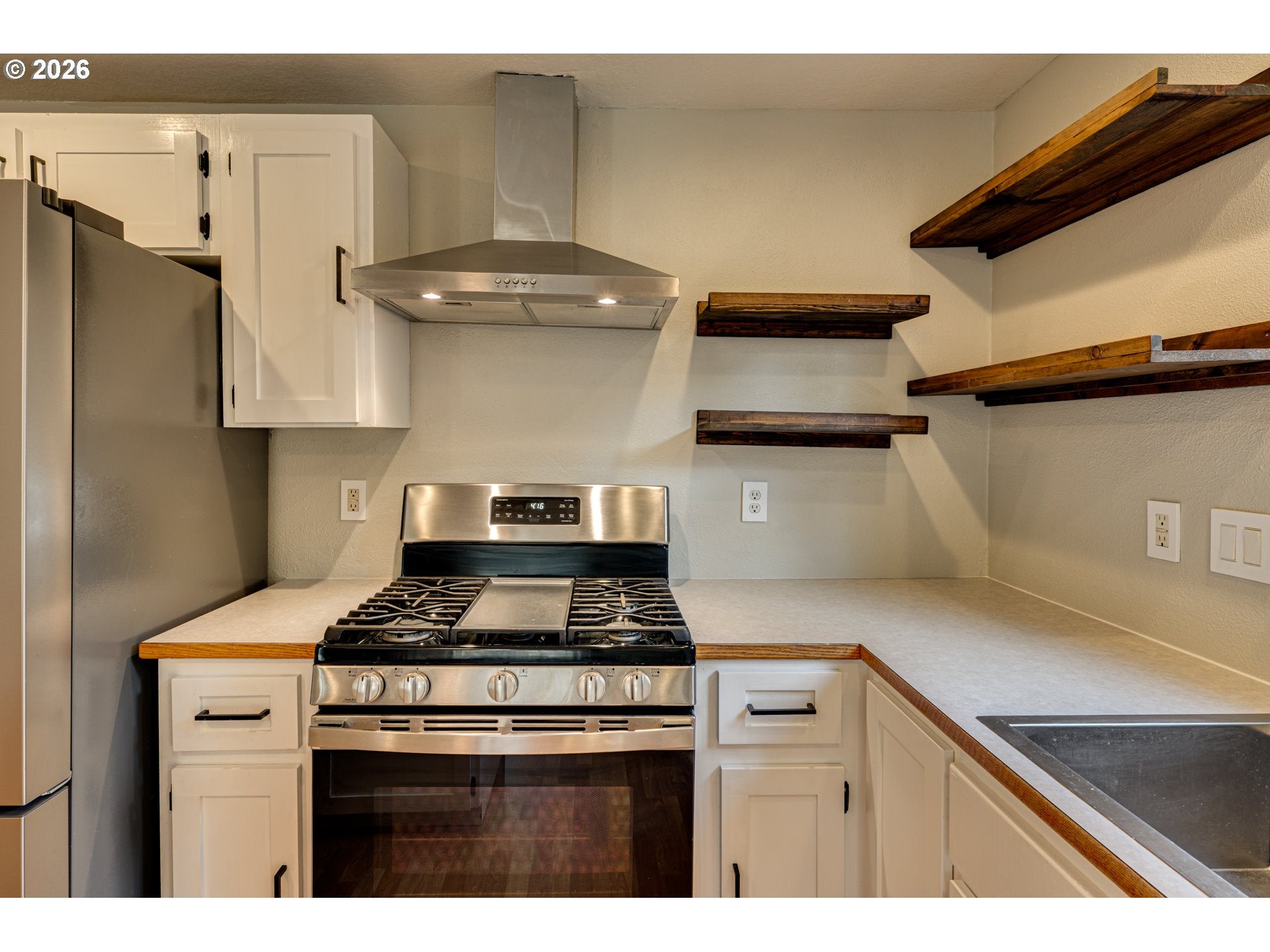 320 NW 25TH PL