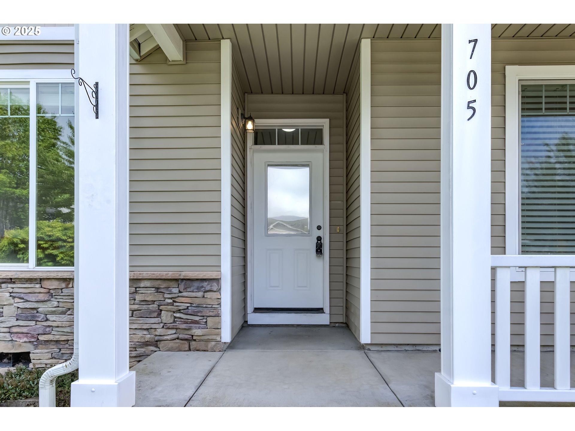 705 NW 25TH AVE