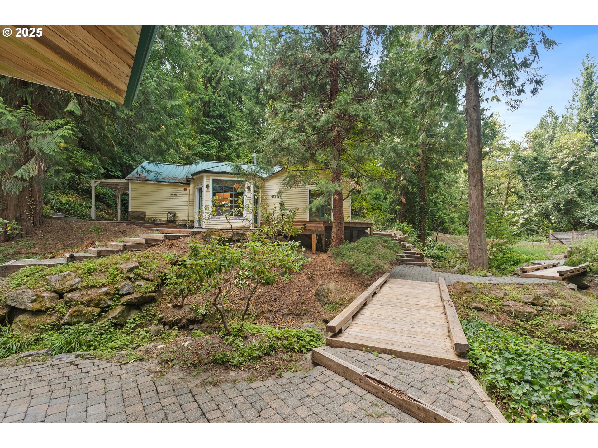 6131 NW THOMPSON RD