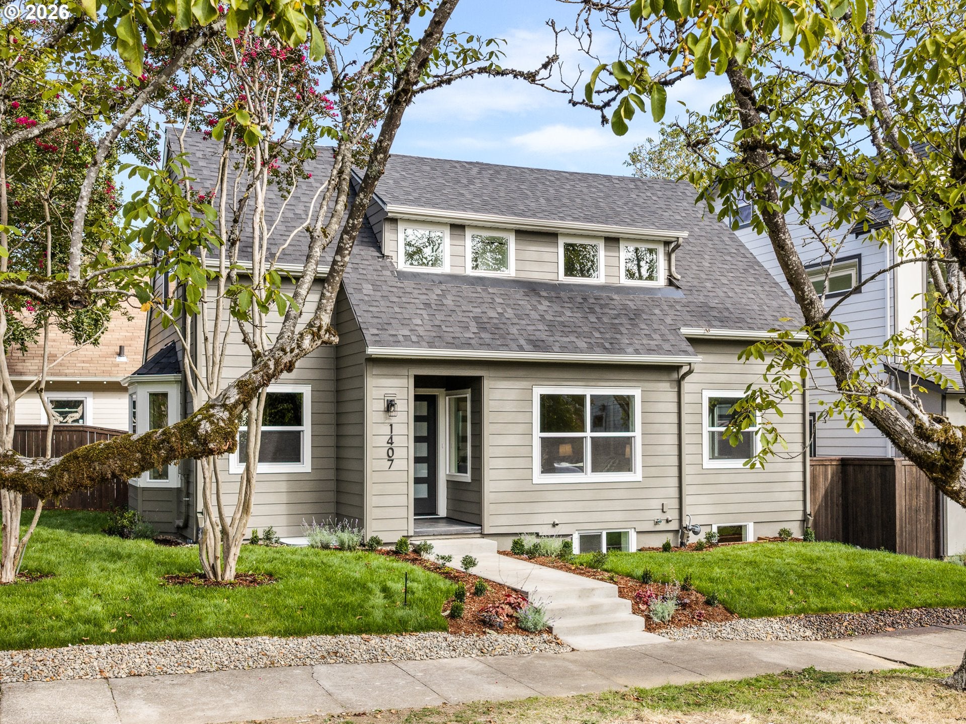 1407 SE Knapp ST — 4 bed 3 bath Single Family Residence