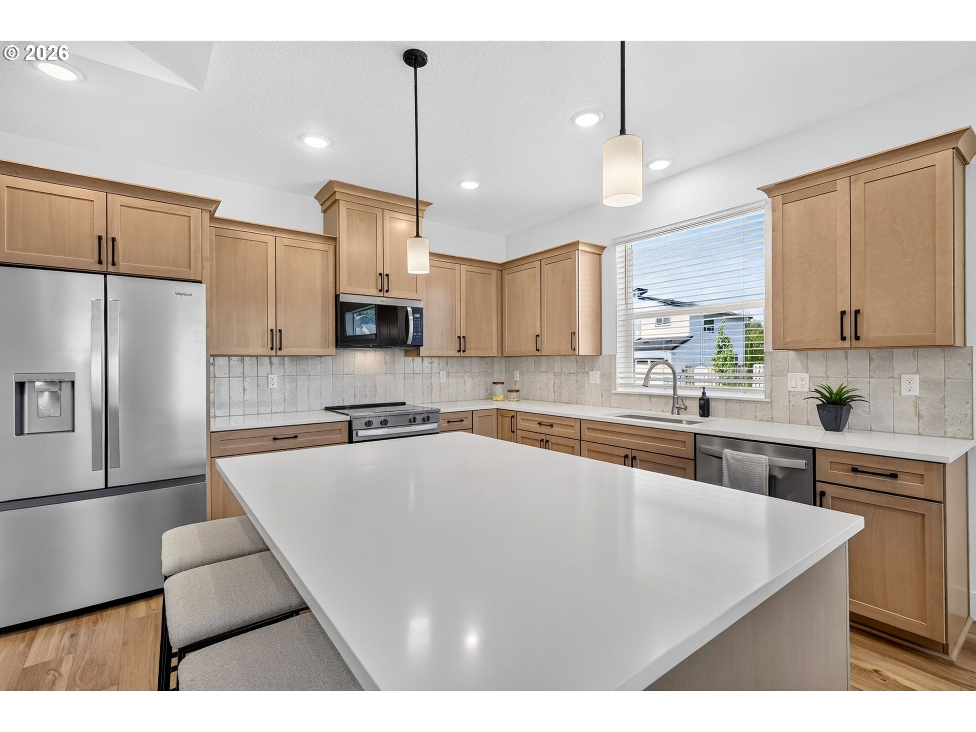 3447 NE Justus AVE 77