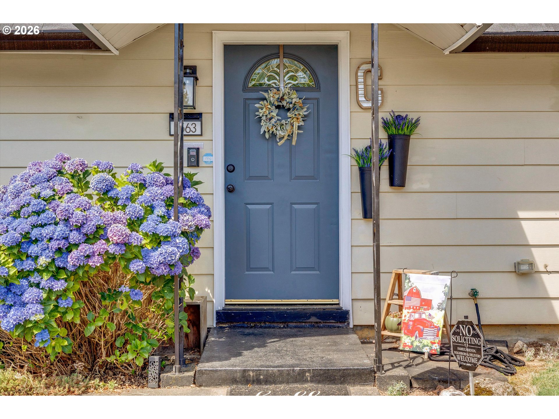 1563 NE VILLAGE SQUIRE CT