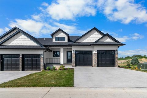 Photo of 380 Hidden Ridge Dr, Coralville, IA 52241 (MLS # 202500344)