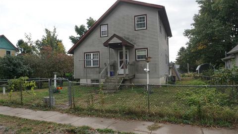 Photo of 407 E Elm St, LoneTree, IA 52755 (MLS # 202506517)
