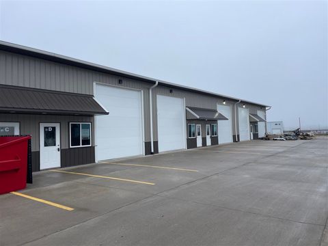 Photo of 128 Greenfield Dr Unit D, IA 52340 (MLS # 202506158)