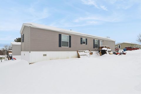 Photo of 3701 2nd St Trlr 66, Coralville, IA 52241 (MLS # 202507273)
