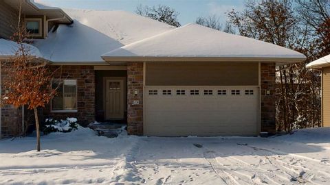 Photo of 18 Holiday Ridge Ln, Coralville, IA 52241 (MLS # 202601066)