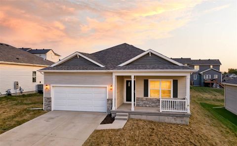 Photo of 720 E Bear Dr, IA 52340 (MLS # 202506089)