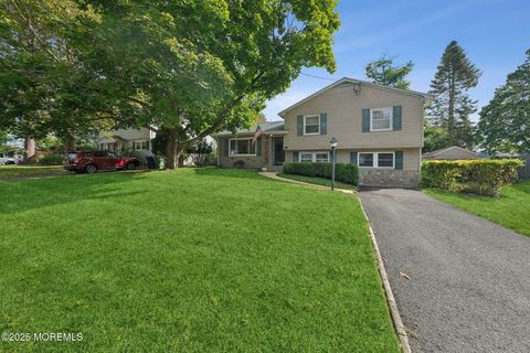 Photo of 18 Jumping Brook Drive, Neptune Township, NJ 07753 (MLS # 22530933)