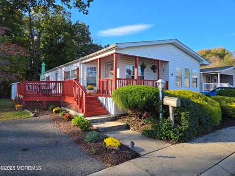 Photo of 98 Woody Road, Freehold, NJ 07728 (MLS # 22531643)