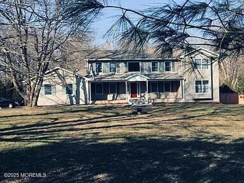Photo of 124 Taylors Mills Road, Manalapan, NJ 07726 (MLS # 22530585)