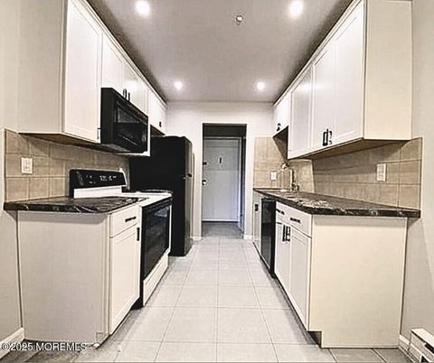 Photo of 54 Amberly Drive #G, Manalapan, NJ 07726 (MLS # 22531269)