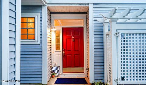 Photo of 37 Golden Eye Lane, Port Monmouth, NJ 07758 (MLS # 22605667)
