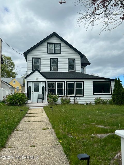 Photo of 235 S Lincoln Avenue, Long Branch, NJ 07740 (MLS # 22610690)