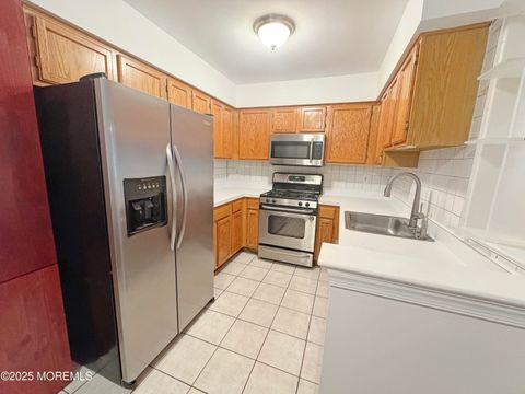 Photo of 577 Windflower Court, Morganville, NJ 07751 (MLS # 22535787)