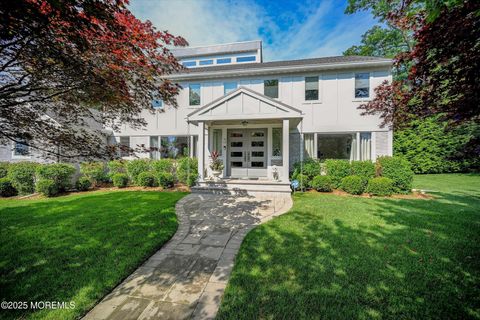 Photo of 3 Woods Road, West Long Branch, NJ 07764 (MLS # 22605712)