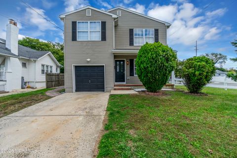 Photo of 310 Atkins Avenue, Neptune Township, NJ 07753 (MLS # 22531124)