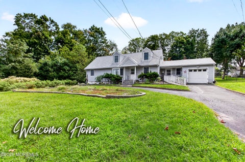 Photo of 33 Tennent Road, Morganville, NJ 07751 (MLS # 22627655)