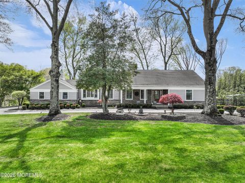 Photo of 24 Laurelwood Drive, Colts Neck, NJ 07722 (MLS # 22610170)