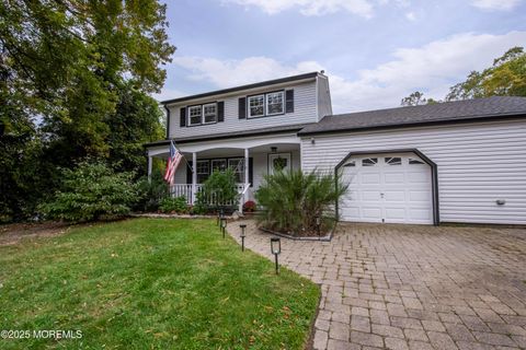 Photo of 216 Ivins Road, Neptune Township, NJ 07753 (MLS # 22531146)