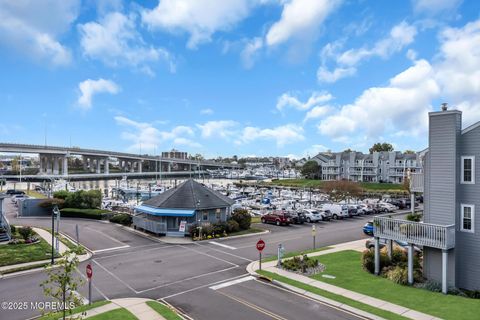 Photo of 303 Spinnaker Way, Neptune Township, NJ 07753 (MLS # 22535252)