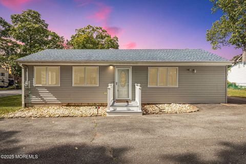 Photo of 607 S Riverside Drive, Neptune Township, NJ 07753 (MLS # 22530857)