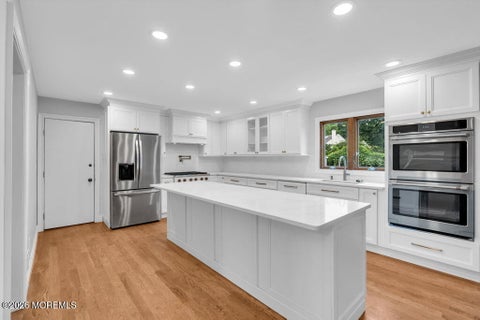 Photo of 6 Oak Tree Lane, Ocean Twp, NJ 07712 (MLS # 22632648)