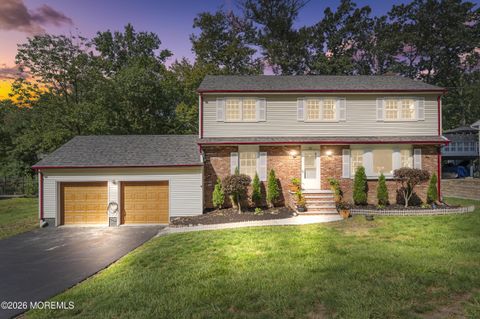 Photo of 55 Ainsworth Avenue, East Brunswick, NJ 08816 (MLS # 22611077)