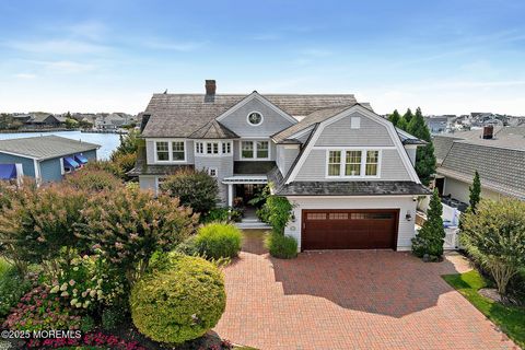 Photo of 176 Squan Beach Drive, Mantoloking, NJ 08738 (MLS # 22610387)