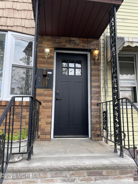 Photo of 79 1/2 Merchant Street, Newark, NJ 07105 (MLS # 22601497)