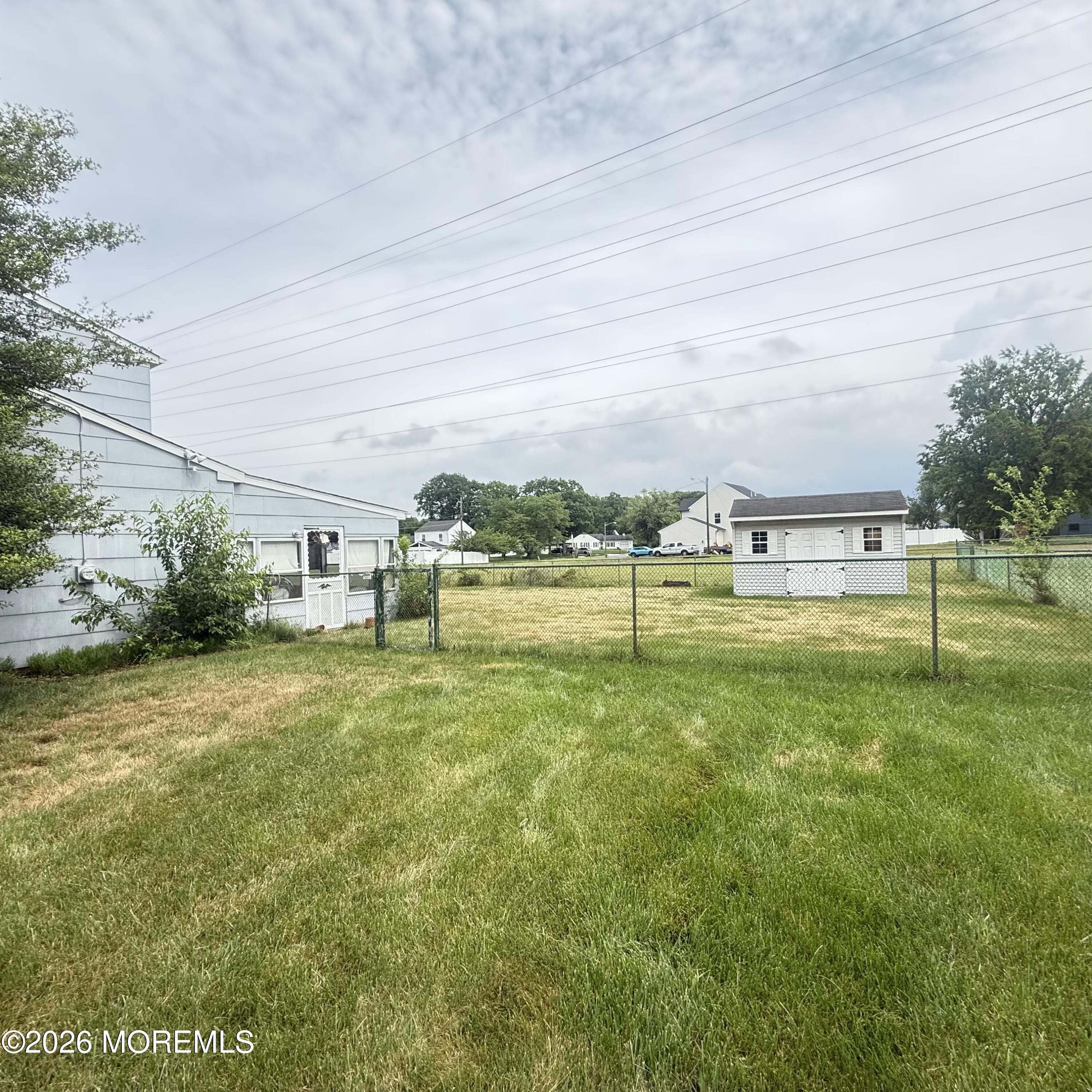 Rear yard of spacious corner property