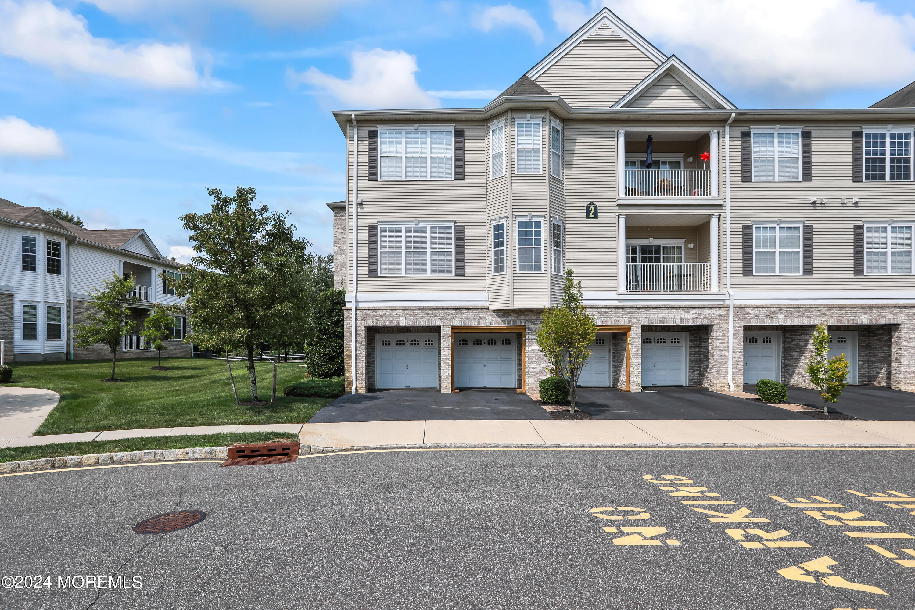 210 Canterbury Lane #210, Morganville, New Jersey image 1