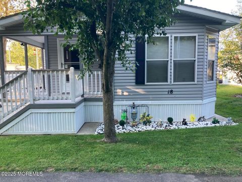 Photo of 18 Village Road, Morganville, NJ 07751 (MLS # 22535554)