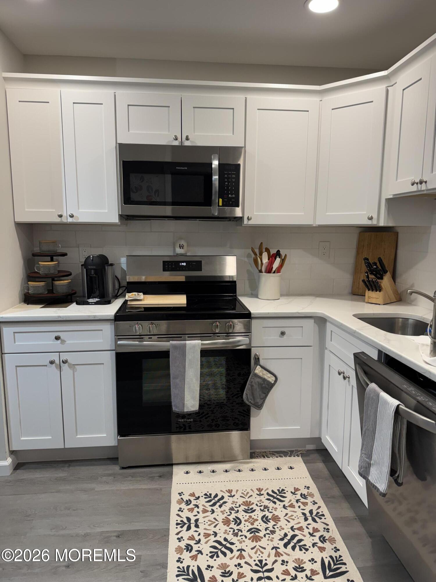 Photo 1 of 17 — 105 W Amberly Drive W G, Manalapan, NJ 07726