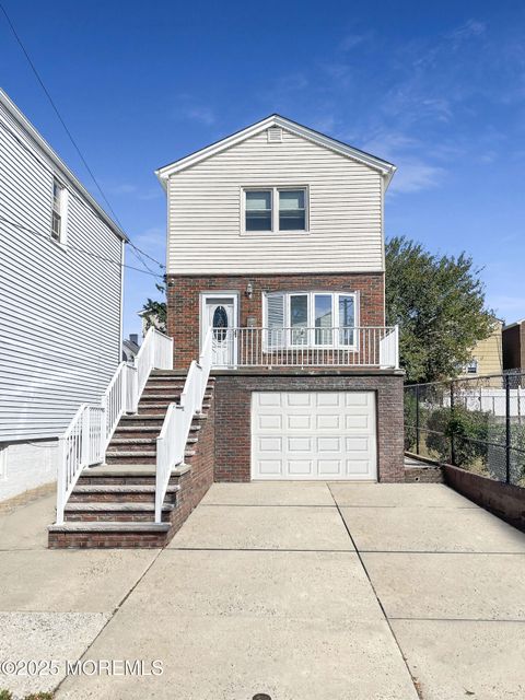 Photo of 63 Cottage Street, Bayonne, NJ 07002 (MLS # 22530765)