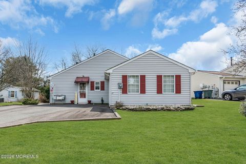 Photo of 46 Pilgrim Avenue, Tinton Falls, NJ 07753 (MLS # 22607352)