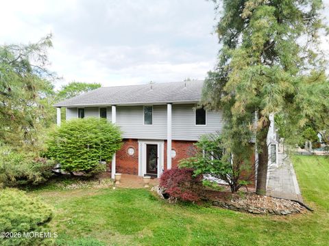 Photo of 1 Flintlock Road, Freehold, NJ 07728 (MLS # 22610578)