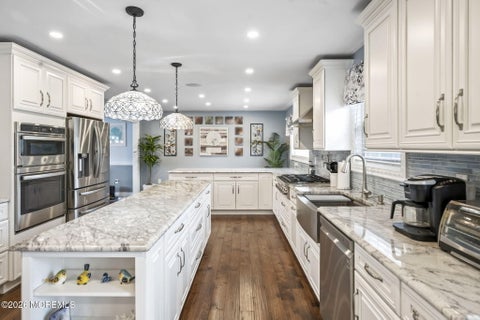 Photo of 30 Kentucky Drive, Hazlet, NJ 07730 (MLS # 22615845)