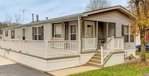 Photo of 18 Village Road, Morganville, NJ 07751 (MLS # 22601323)