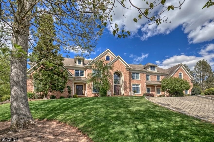 Truly elegant fully brick Manor Home is located in one of Warren's most prestigious neighborhoods.Thoughtfully designed for both today's lifestyle & mult-generational living, this home includes a separate 2 bedroom, 2 bath apartment with all the amenities.The main section encompasses 5 bedroom en-suites which includes a first floor guest en-suite. The minute you enter the grand foyer with sweeping staircase, your senses will be awakened. A banquet size dining room is well appointed with deep moldings, high ceiling & hardwood floor.Butler Pantry opens to the spacious kitchen any chef would delight in. Enter the Great room with dramatic 2 story ceiling, gas fireplace, Dual French doors & custom entertainment unit. Both a private & interior entrance access the apartment with generous size rooms which include a foyer, library/office, open concept kitchen, breakfast area, living room & laundry. The main bedroom has dual walk in closets & a lavish bath & private patio from the breakfast area. The second level of this manor home has a large Primary Suite complete with a sitting room, fireplace, a large bedroom chamber with a tray ceiling.Enjoy the spa like bath with over-sized steam shower, sauna & vanities.There are 2 closets & an office & private balcony.Three more en-suite bedrooms each with a fitted closet, laundry room, media room w built-in desks plus a card room complete this level. Entertain comfortably in the lower with level billiard, kitchen, dining room,gym & bath.