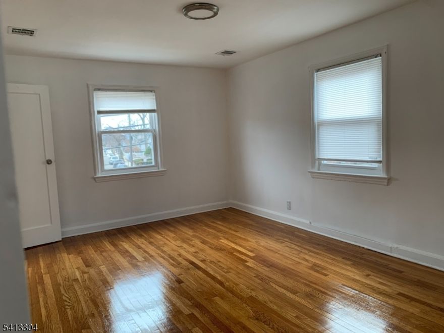 Charming two-family home in a two-story half of a quadruplex.  The first floor unit features a living room, eat-in-kitchen, bedroom, and full bath, with direct access to a finished basement offering a recreation room, additional bedroom, full bath, storage, and utility area.  The updated second floor unit includes a living room, eat-in kitchen, bedroom, and full bath, plus central air conditioning.  Both units enjoy abundant natural light.  The fenced backyard provides space for outdoor gatherings, and the driveway accommodates off-street parking for two vehicles.  It's a must see!!!