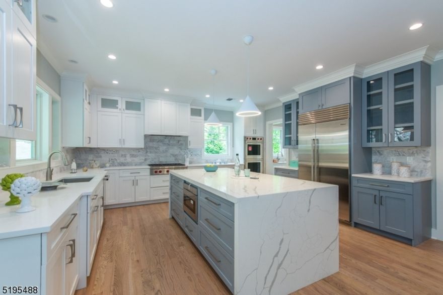 Owner's rep listed below. Brand new construction! Welcome to your exquisite, bespoke home nestled against the scenic South Mountain Reservation, boasting breathtaking vistas of New York City! Whether you work remotely or commute to the city, you can easily access the train station for a quick 40-minute ride. This residence offers a peaceful, charming ambiance, with five generously sized bedrooms, five full bathrooms, and one half bath, providing abundant space for all occupants. The first floor boasts a gourmet kitchen with Butler's pantry, perfect for whipping up delicious meals, and the family room is steps away. Perfect for those dinner parties and the overflow! The oversized living room and dining room are ready for entertaining. The sunlit first floor office has a fireplace that is open to the living room. The guest bedroom suite completes this floor. The second floor is a true oasis, featuring an oversized owner suite with two dressing rooms and a full bath complete with a jetted tub and separate shower. The second floor also has 3 more bedrooms, with 2 additional bathrooms, providing plenty of space and privacy for everyone. The Lower level is where you will find the 3 car garage, rec room and full bath. This home truly has it all - luxurious finishes, ample space, stunning views, and a prime location. Don't miss out on the opportunity to make this spectacular home yours!