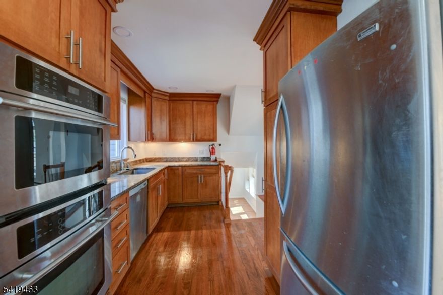 Welcome to this 4 Bedroom 2.5 Bathroom cul-de-sac beautiful home in the heart of Randolph, NJ! This charming residence perfect for comfortable living. Step outside to enjoy your private deck and backyard or your private balcony overlooking beautiful views, ideal for outdoor gatherings or peaceful relaxation. The Laundry room, Family room, Living room and dining room offers convenience and functionality for everyday life. You'll appreciate multiple windows, walk-in closet, the aaditional rooms and a half bath in the basement for additional storage and comfort. With Two fire places, your comfort is guaranteed during winter. The kitchen is equipped with stainless steel appliances, including a refrigerator, gas stove, wall oven, microwave, and dishwasher, making meal prep a delight. Waher/Dryer Hookup. Conveniently located near schools, parks, transportation, shopping, and dining, this home is well-situated for a vibrant lifestyle. Don't miss out on the opportunity to make this wonderful house your new home! Act Quickly.....