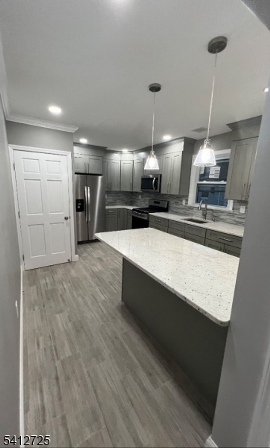 Beautifully renovated 3-bedroom, 1-bath second-floor apartment offering a spacious layout and modern upgrades throughout. Enjoy central AC and heating, updated finishes, and a move-in-ready space. Prime location close to Newark Airport and major transportation hubs for easy access to NYC and surrounding areas. Parking available for an additional fee. Ready for March 1st occupancy!