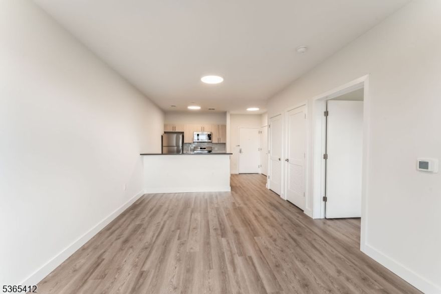 PINNACLE by PEEK is NOW LEASING! Experience the perfect fusion of luxury and convenience with our newly available rentals in Orange, NJ. Ideally located just steps from the Orange Train Station, PINNACLE by PEEK offers a sophisticated selection of studio, one-bedroom, and two-bedroom residences, all thoughtfully crafted for contemporary living. Each unit features sleek, stainless steel appliances, eco-friendly heating and cooling systems to enhance sustainability, and spacious walk-in closets for optimal storage. Residents are invited to enjoy an impressive array of premium amenities, including a resident's game room lounge with outdoor access for socializing and relaxation, a well-equipped fitness lounge to support your active lifestyle, and additional rooftop access for stunning views. Discover a new standard of stylish, comfortable living at PINNACLE by PEEK.