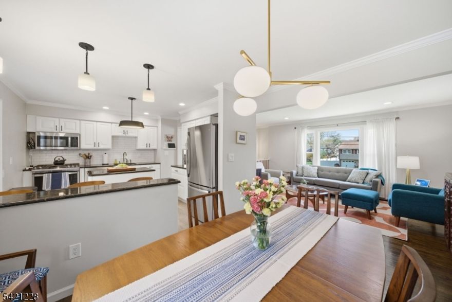 Simple perfection just got an upgrade. Welcome to this beautifully updated bi-level home, tucked away on a quiet double cul-de-sac in the sought-after Rolling Acres section of Boonton. With 4 bedrooms and a layout that actually makes sense, this home blends comfort, function, and style without trying too hard.The sun-drenched main level delivers from the moment you walk in rich hardwood floors, a bright and inviting living room, a formal dining space, and an updated eat-in kitchen featuring granite countertops, stainless steel appliances, and clean, modern finishes that don't need explaining.Downstairs, a fully finished lower level gives you the flexibility everyone wants but rarely finds perfect for entertaining, unwinding, or claiming your own space when the house is full.Then there's the backyard and this is where it separates itself. Elevated deck, covered patio with ceiling fan and TV setup, and a sprawling paver patio that creates multiple zones for hosting, dining, or doing absolutely nothing. It backs to parkland, so instead of neighbors, you get peace, privacy, and a view that doesn't get old.And yes, there's a whole house generator because losing power is inconvenient  unless you live here, in which case it's just something that happens to other people.One-car garage, wide driveway, meticulously maintained throughout. This isn't just another listing it's a home that actually delivers on what people say they want.