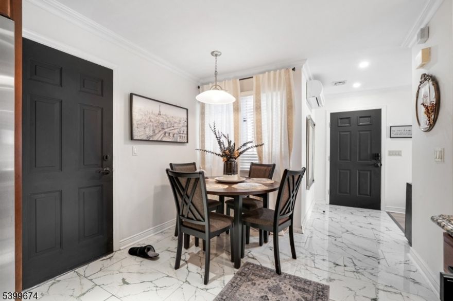 Discover luxury living in this beautiful appointment Haledon townhouse, perfectly positioned to capture mountain views and striking NYC skyline vistas.  Designed for comfort and sophistication, this home features an open and airy layout enhanced by elegant modern finishes and abundant natural light.  The gourmet kitchen offers granite counter tops, custom wood cabinetry and stainless steel appliances seamlessly connecting to the refined living room and dining areas -- ideal for both relaxed living and upscale entertaining.  The serene primary suite includes generous space and a spa-inspired  bath with a classic soaking tub and designer details.  Updated flooring, thoughtfully curated decor elements and meticulously maintained interiors elevate the home's upscale appeal.  Enjoy the convenience of a one-car garage plus an additional private driveway parking space, a rare benefit of townhouse Living.  with its exceptional view, refined style and prime location, this townhouse offers a distinguished lifestyle opportunity you won't want to miss.