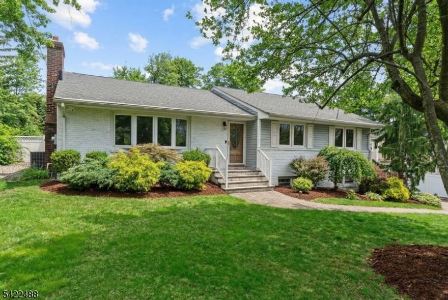 Welcome to this FABULOUS 3 bed/3 full bath ranch on an oversized lot!  Perfectly suited for gatherings of any size, with exceptional indoor and outdoor entertaining spaces. Beautifully updated kitchen and baths, along with a fully finished basement and BONUS office/den/exercise room with a separate entrance for added living space. Kitchen is complete with a wet bar, granite counter tops, SS Appliances, Wolf cook top and opens up to a Grand Great Room.  Gleaming hardwood floors throughout complemented by two fireplaces that truly complete the home. Fenced in yard with levels of patio pavers, built-in brick bbq (see remarks), and professionally landscaped grounds that offer total privacy. Conveniently located near grammar and middle schools, parks and school bus stop.  SET IN  A PRIME LOCATION WITHIN A HIGHLY DESIRABLE COMMUNITY!