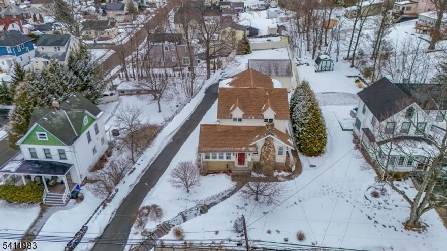 In the very heart of Butler stands this timeless Colonial, reflecting years of attentive care and pride of ownership. From the moment you arrive, the recently completed front sidewalk and stately stairs welcome you to a residence filled with warmth and character. Full of natural sunlight brightening every room and highlighting the gracious proportions that only a classic home can offer.Thoughtfully updated with major renovations completed in the past 10-13 years, the home blends enduring craftsmanship with the comfort today's homeowners appreciate. A versatile wrap-around enclosed front porch leads up to an open floor dining and living room area. The kitchen offers its own entrance to the side yard, a breakfast nook with bay windows. This floor includes two bedrooms and an office/bedroom with a full bath. The second floor beautiful landing leads to a private expansive primary suite with a sitting area, walk-in closet, and full bath. Three additional bedrooms are all generously sized and a full hallway bathroom with double sink completes this floor. The full basement, with high ceilings, offers tremendous potential for future finishing, storage, or recreation.Outdoors, the property continues to impress with an exceptionally large yard and an oversized two-car garage with a full attic above. Carefully maintained and move-in ready, this is a rare opportunity to own a Butler Colonial home where space and comfort come together beautifully.